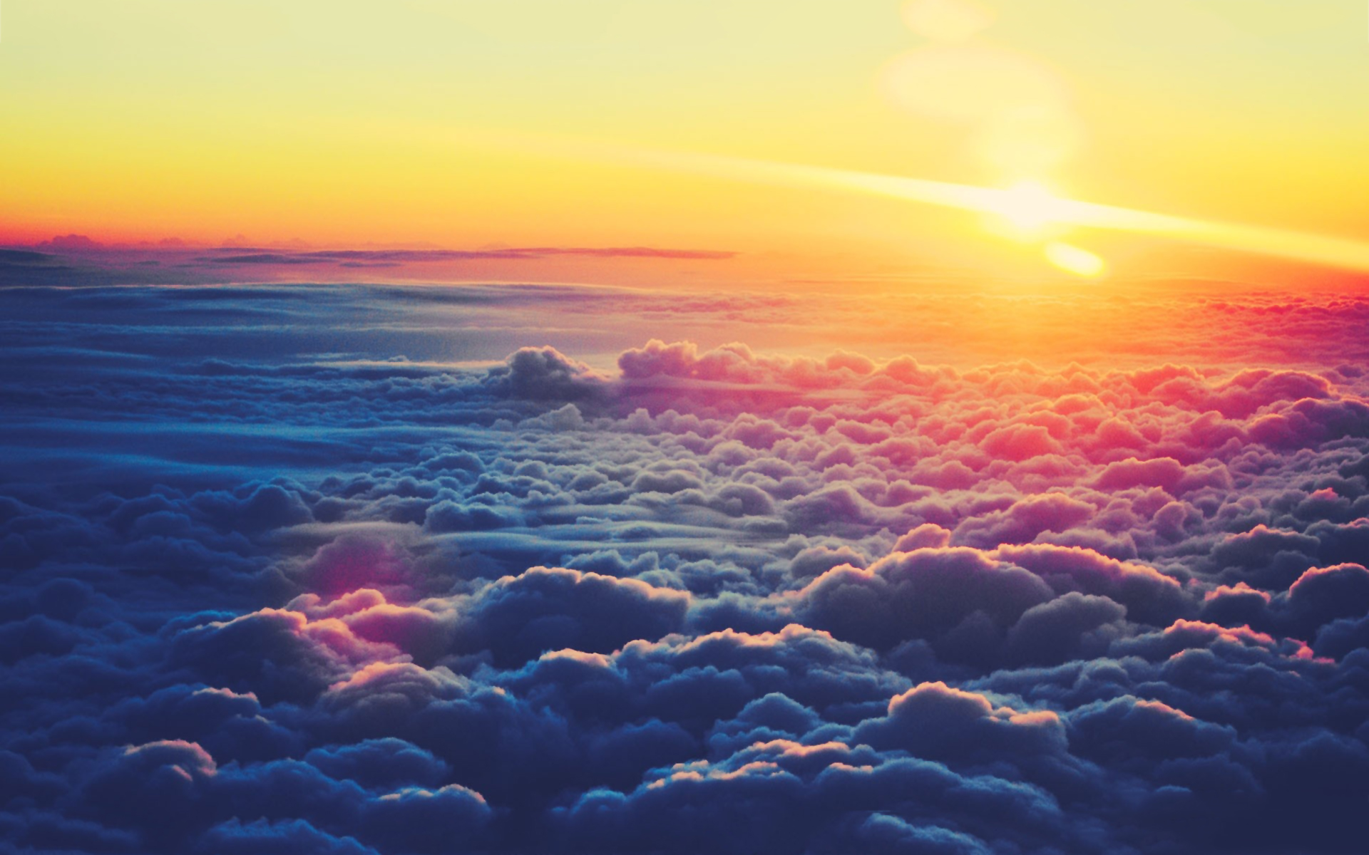 7021060-sunset-over-clouds.jpg