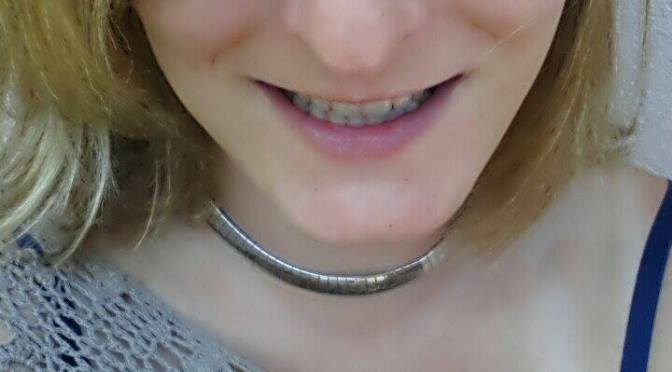 :) Smiling.